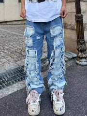 Ripped ripped patch jeans