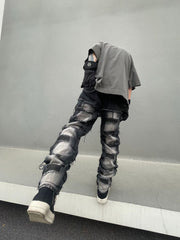 Raw edge ripped patched slim fit jeans