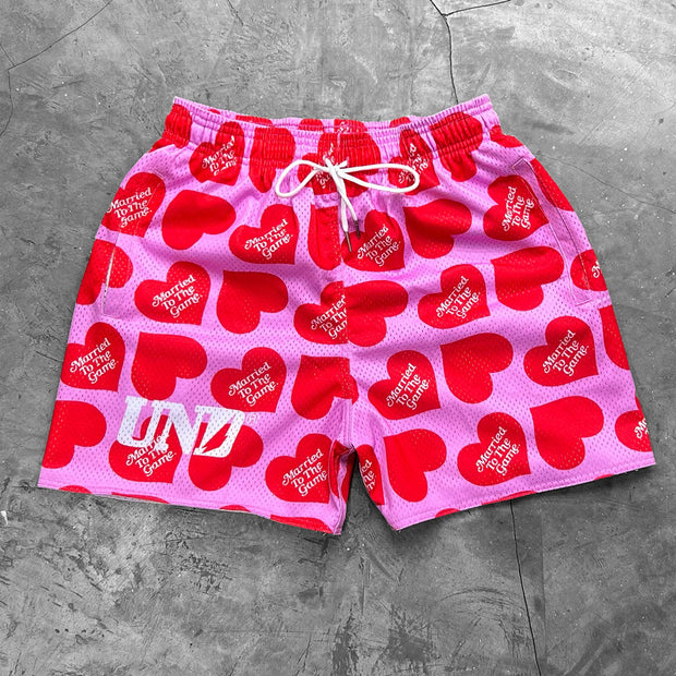 Pink love print mesh shorts