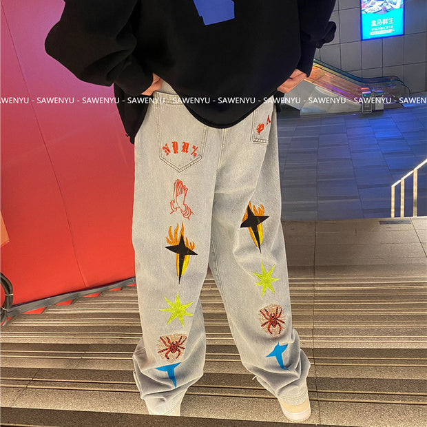 graffiti embroidered jeans