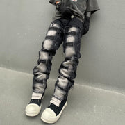 Raw edge ripped patched slim fit jeans