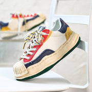 Dissolved shell toe color block shoes
