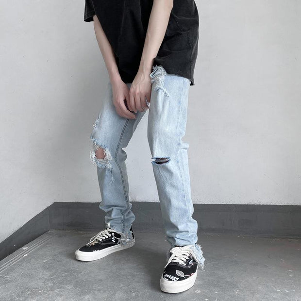 High street trend raw edge ripped jeans male ins tide thin section thin denim trousers