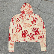 Red handprint hooded sweatshirt