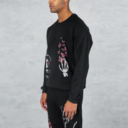 Crew neck long-sleeved sweatshirt with palm and skull personality pattern