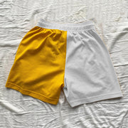 Contrasting color lightning print track shorts