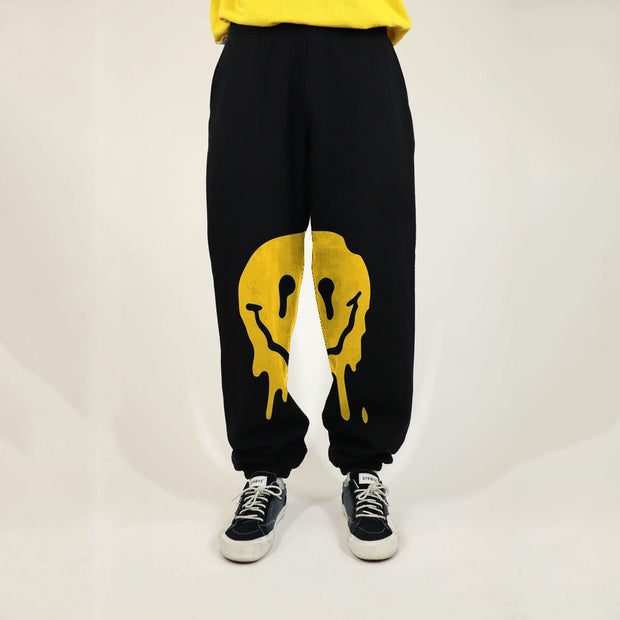Street casual style melted smiley printed trousers