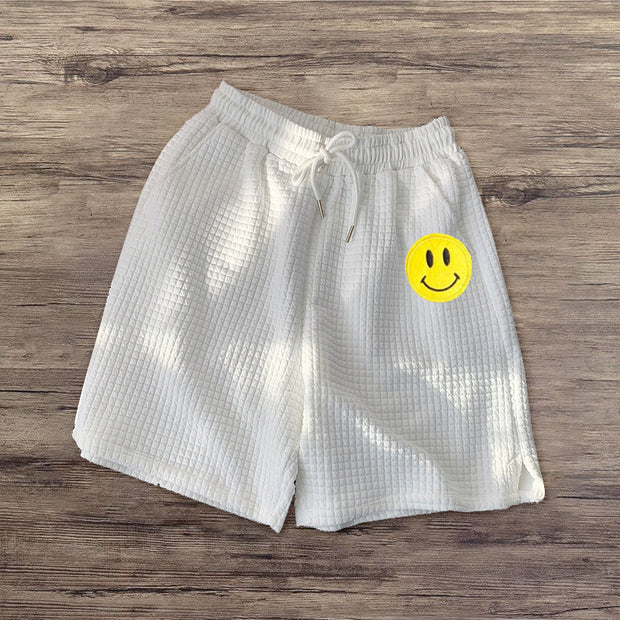 Smiley print waffle shorts