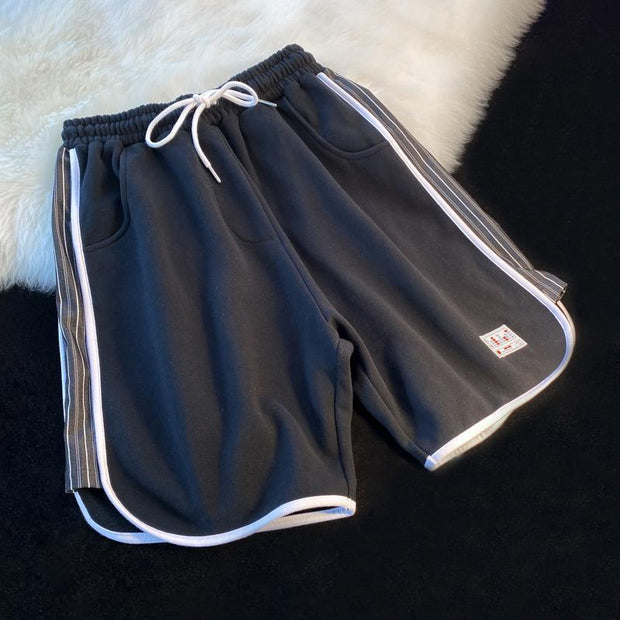 Color matching split striped loose basketball five-point pants