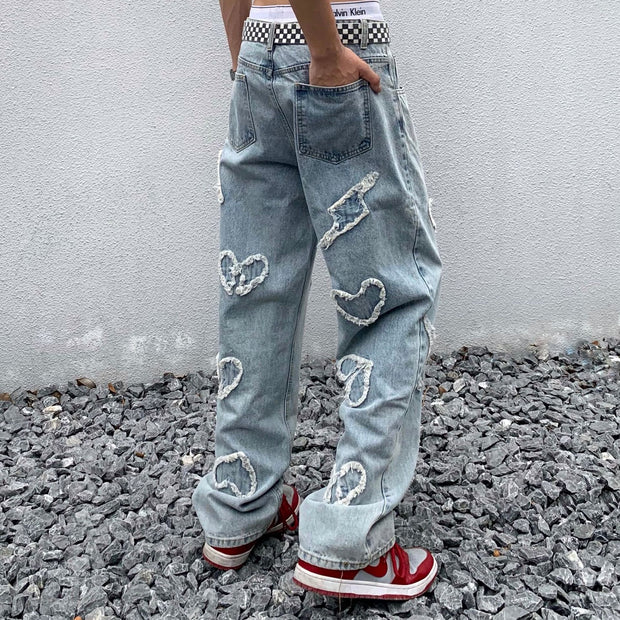 High street washed and worn patch trousers