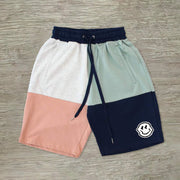 Colorblock smiley track shorts