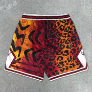 Statement leopard print track shorts